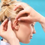 Causes of ear pain when wearing hearing aids